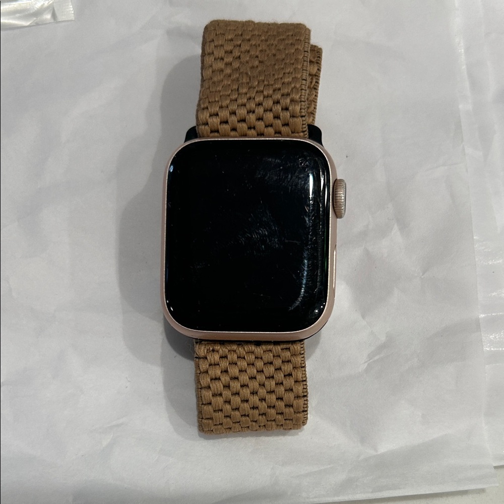 Apple Watch rose gold face with Woven Tan Band